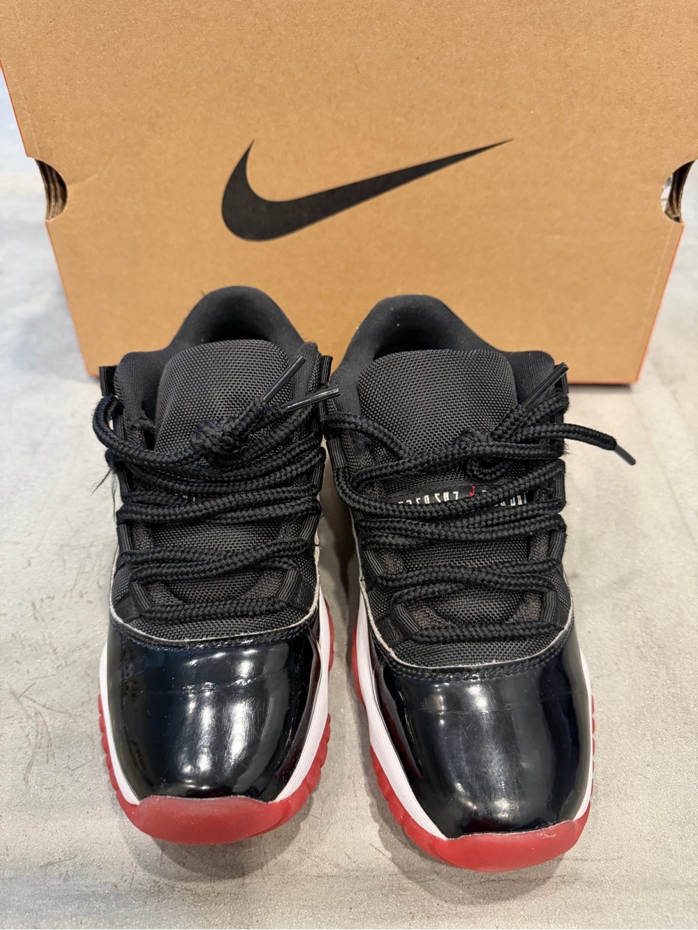 Nike Air Jordan Kids Black and Red Low-Top Retro Sneakers